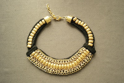 Collier tricot noir et doré